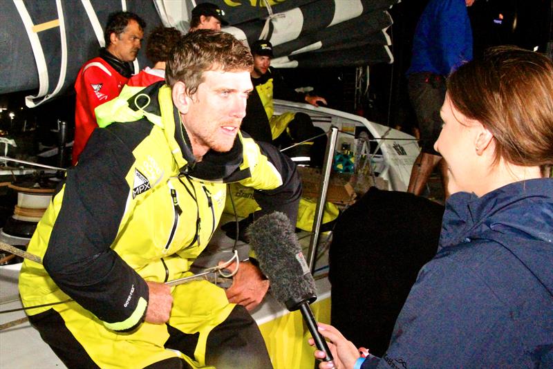 Peter Burling (Team Brunel) is interviewed by NZ media at 3.00am after 20 days at sea. Volvo Ocean Race - Leg 6 Finish, Auckland, February 28, photo copyright Richard Gladwell taken at  and featuring the Volvo One-Design class