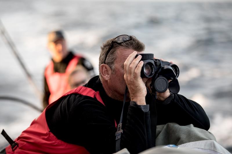 Volvo Ocean Race  Leg 7 from Auckland to Itajai, day 2 on board Sun Hung Kai / Scallywag. David Witt keeping and eye on the competition 19 March photo copyright Konrad Frost / Volvo Ocean Race taken at  and featuring the Volvo One-Design class