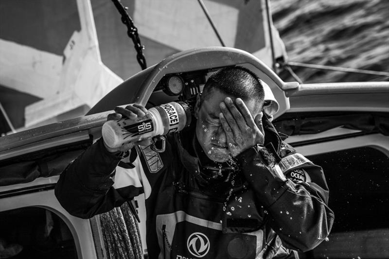 Volvo Ocean Race Leg 7 from Auckland to Itajai, day 02 on board Dongfeng. Time for a quick fresh shower for Horace. 19 March photo copyright Martin Keruzore / Volvo Ocean Race taken at  and featuring the Volvo One-Design class