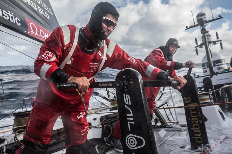 Leg 7 from Auckland to Itajai, day 02 on board Sun Hung Kai / Scallywag. Alex Gough and Trystan Seal wind on the headsail. 19 March,  photo copyright Konrad Frost / Volvo Ocean Race taken at  and featuring the Volvo One-Design class