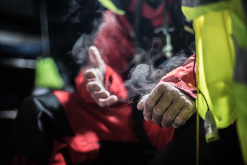 Leg 7 from Auckland to Itajai, day 6 on board Sun Hung Kai / Scallywag. Steam from Alex Goughs hands after being on deck. 24 March,  photo copyright Konrad Frost / Volvo Ocean Race taken at  and featuring the Volvo One-Design class