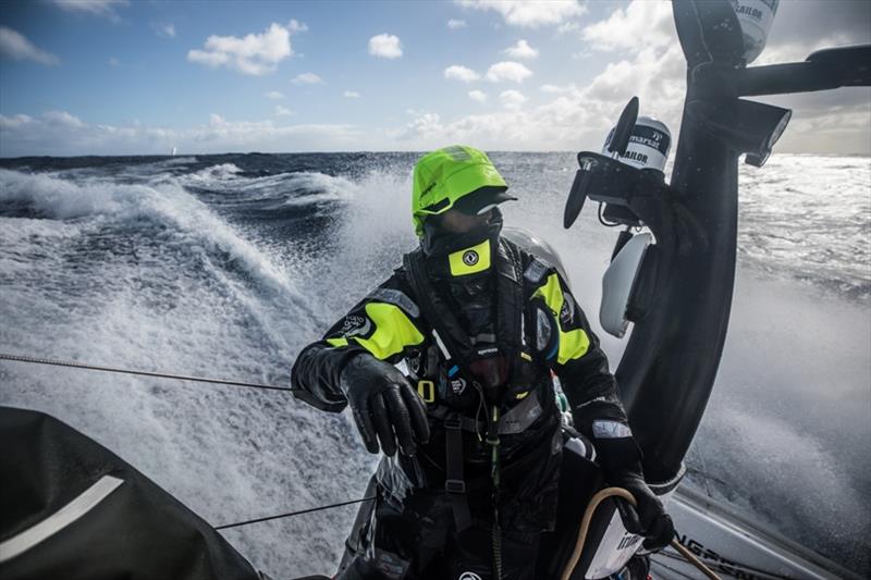 Volvo Ocean Race Leg 7 from Auckland to Itajai, day 09 on board Dongfeng. Daryl Wislang trimming the mian whil Vestas is trying to stay in our wake - photo © Martin Keruzore / Volvo Ocean Race