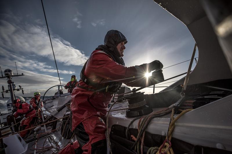 Leg 7 from Auckland to Itajai, Day 9 on board Sun Hung Kai / Scallywag. John Fisher winding the winch during a sail change. 26 March,  photo copyright Konrad Frost / Volvo Ocean Race taken at  and featuring the Volvo One-Design class