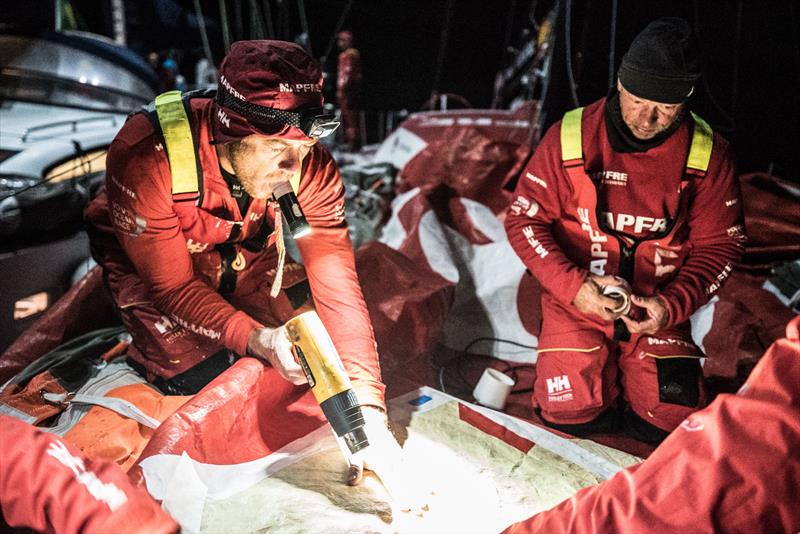 Leg 7 from Auckland to Itajai, day 12 on board MAPFRE, Antonio Cuervas-Mons warming up the glue, 30 March, . - photo © Ugo Fonolla / Volvo Ocean Race