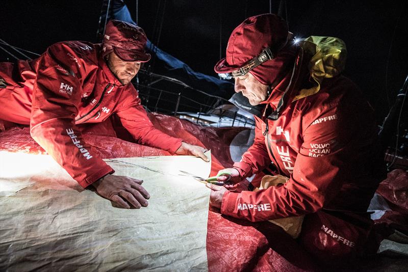 Leg 7 from Auckland to Itajai, day 12 on board MAPFRE, Santi and Blair Tuke cutting a piece of 3Di for the mainsail, 30 March,  photo copyright Ugo Fonolla / Volvo Ocean Race taken at  and featuring the Volvo One-Design class