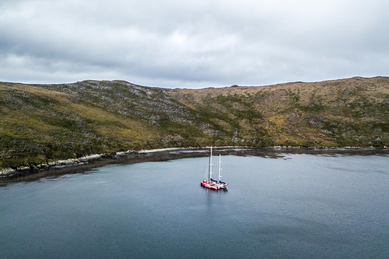 Leg 7 from Auckland to Itajai, day 12 on board MAPFRE, The boat next to the ketch ''Kat'' in a little bay close to Cape Horn to repair the main sail and the mast track, 30 March, . - photo © Ugo Fonolla / Volvo Ocean Race