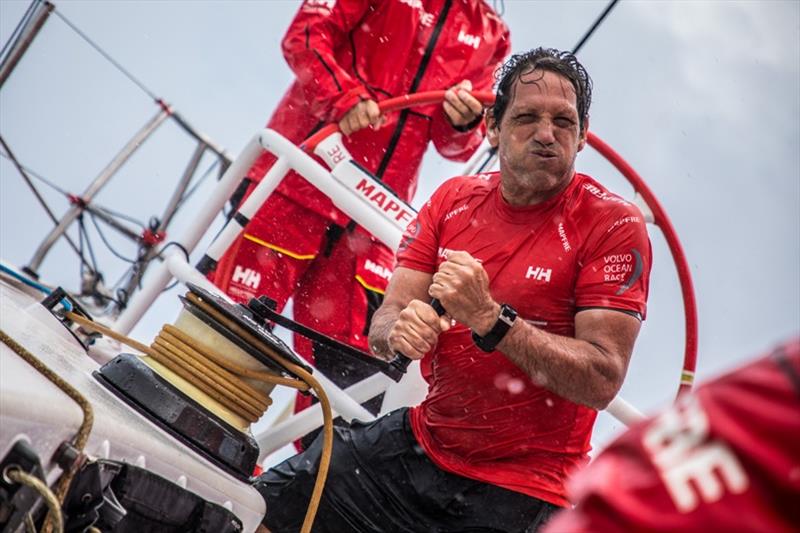Volvo Ocean Race Leg 8 from Itajai to Newport, day 03 on board MAPFRE, Juan Vila trimming the runner during a big squall. - photo © Ugo Fonolla / Volvo Ocean Race