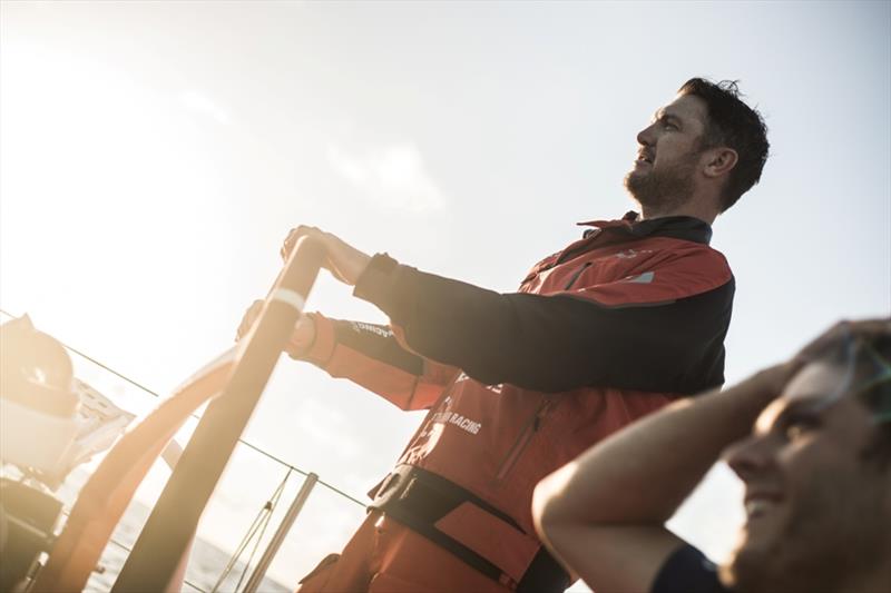 Volvo Ocean Race Leg 8 from Itajai to Newport, day 07, on board Vestas 11th Hour. Phil Harmer driving at the sunrise. - photo © Martin Keruzore / Volvo Ocean Race