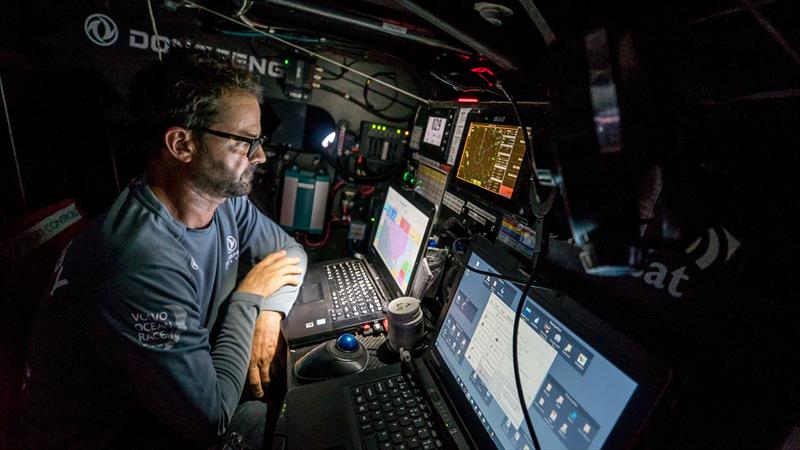 Leg 8 from Itajai to Newport, day 09 on board Dongfeng. 30 April, . Pascal Bidegorry at the nav desk, we just got wind again after entering a cloudy zone photo copyright Jeremie Lecaudey / Volvo Ocean Race taken at  and featuring the Volvo One-Design class