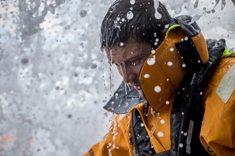 Volvo Ocean Race Leg 8 from Itajai to Newport, day 13, on board Turn the Tide on Plastic.. Henry Bomby in the never ending shower. - photo © James Blake / Volvo Ocean Race