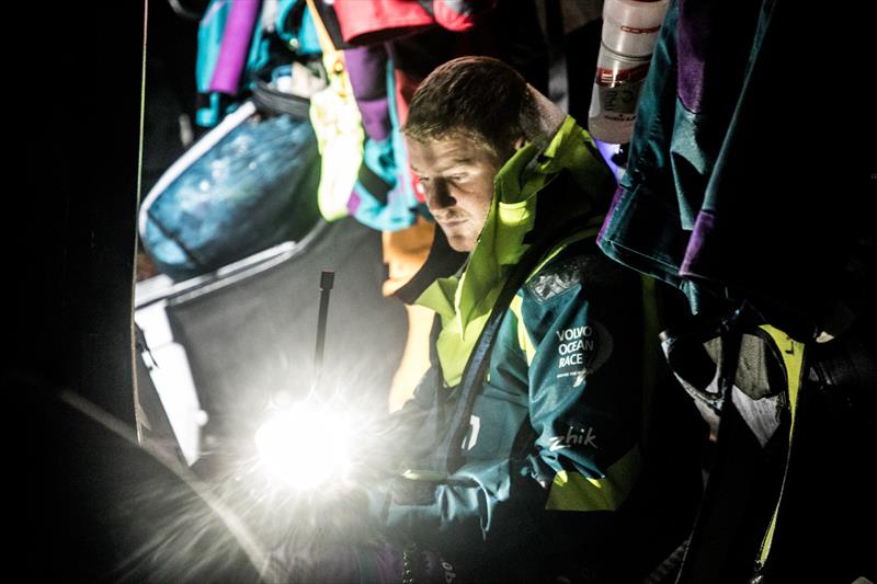 Leg 9, from Newport to Cardiff, day 6 on board Team AkzoNobel. Nicolai Sehested checking an EPIRB checking the safety equipment. 25 May,  photo copyright Konrad Frost / Volvo Ocean Race taken at  and featuring the Volvo One-Design class