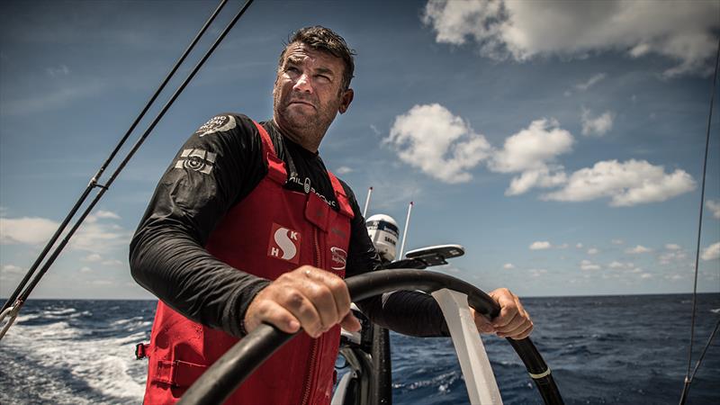 Volvo Ocean Race Leg 9 Newport to Cardiff Day 4 on board Sun Hung Kai / Scallywag. David Witt helming photo copyright Rich Edwards / Volvo Ocean Race taken at  and featuring the Volvo One-Design class