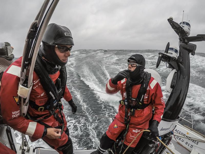 Leg 10, from Cardiff to Gothenburg, Day 5 on board Sun Hung Kai / Scallywag. Anneieke Bes and Antonio Fontes having a chat. With so many layers on its very hard to hear what anyone is saying. 14 June, 2018 - photo © Konrad Frost / Volvo Ocean Race