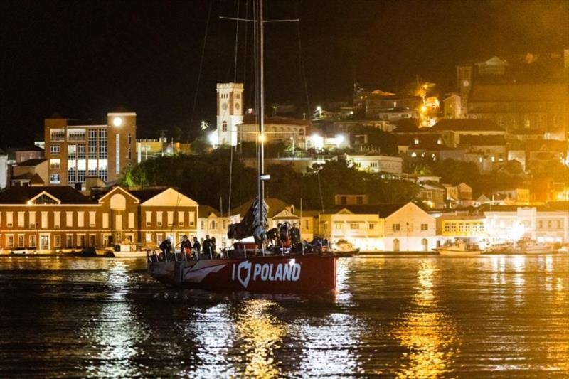 The Volvo Open 70 I Love Poland makes her way into Port Louis Marina photo copyright Arthur Daniel / RORC taken at Royal Ocean Racing Club and featuring the Volvo 70 class