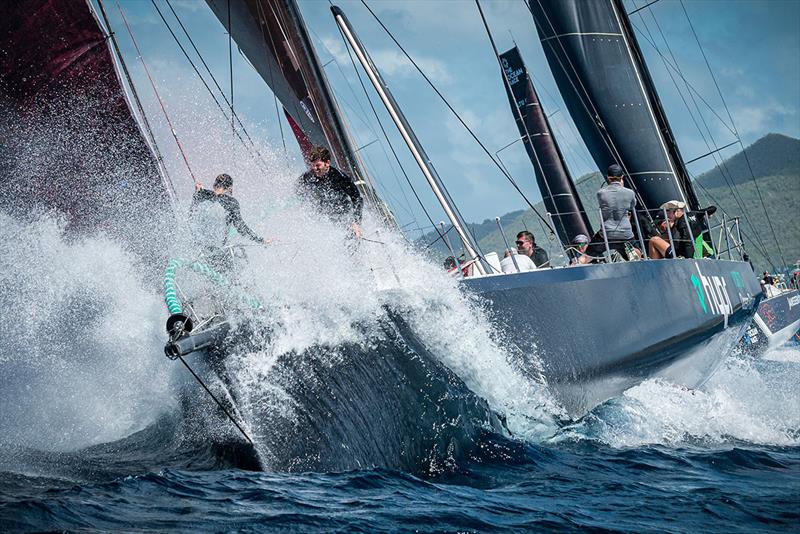 VO70 Hypr reaches towards the windward offset mark, as the bow team prepares for a hoist with Janssen de Jong VO65 right on their heels - St. Maarten Heineken Regatta - photo © Laurens Morel