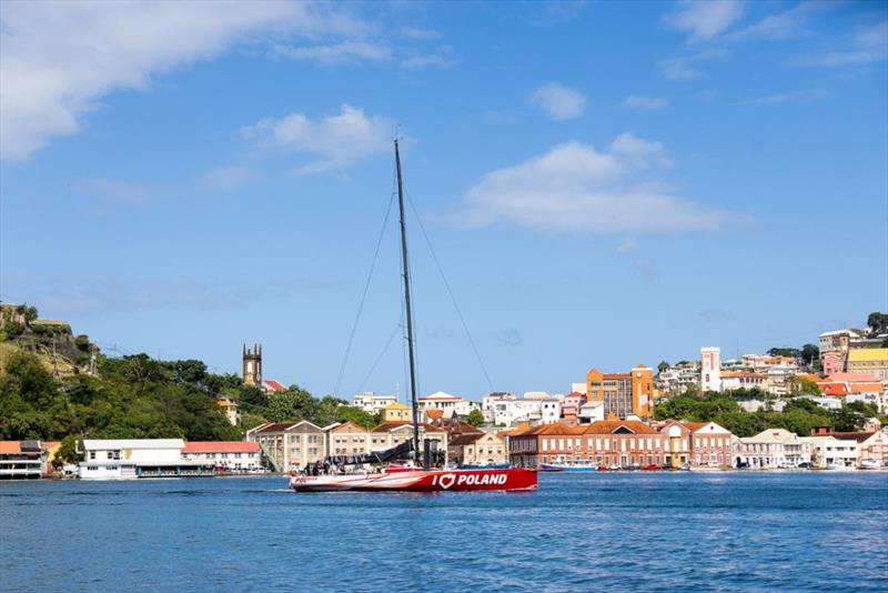 I Love Poland makes her way to the dock and waiting crowds at Port Louis Marina - 2023 RORC Transatlantic Race - photo © Arthur Daniel / RORC