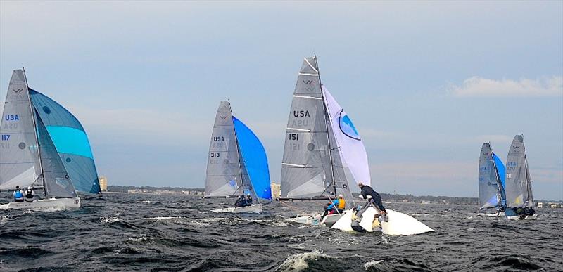 Sarah Alexander, Katja Sertl and Mariah LeffingwellIn leveraging their boat upright after their capsize, one of five, on Pensacola Bay on the first downwind leg of Race #1 of the VX One Midwinter Championship, Regatta #2 of the Winter Series - photo © Talbot Wilson