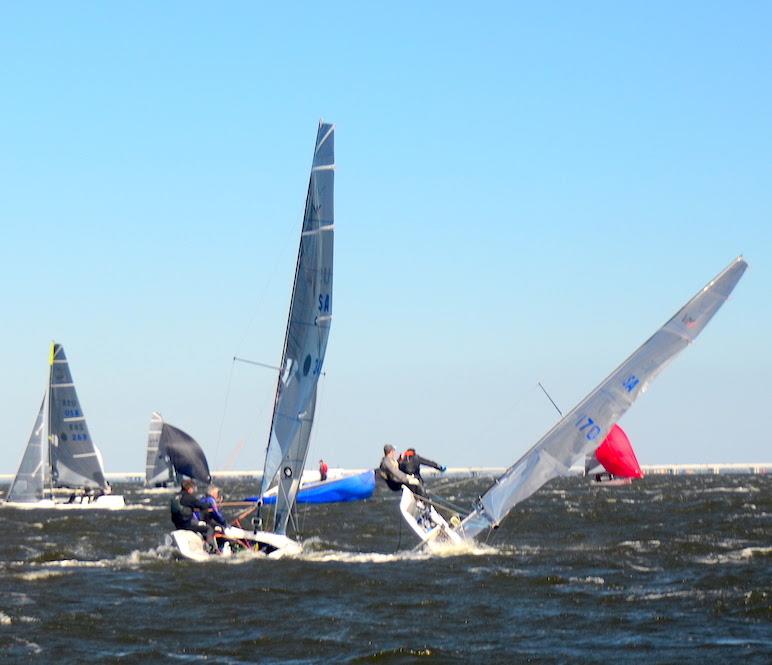 After rounding the leeward gate, Ricky Welch and 'Counterproductive' take a knockdown in the VX One Midwinter Series #3. Four boats capsized in the first race on Saturday when puffs were hitting 22 . - photo © Talbot Wilson