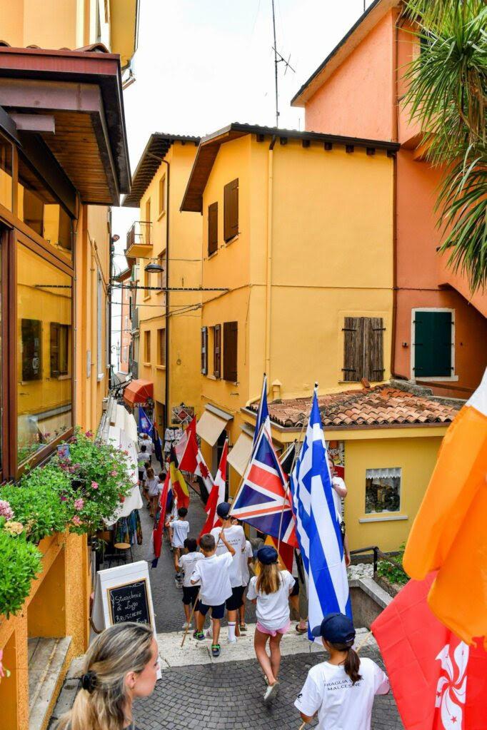 The International WASZP Games is officially opened at Malcesine, Lake Garda, Italy photo copyright James Tomlinson taken at Fraglia Vela Malcesine and featuring the WASZP class