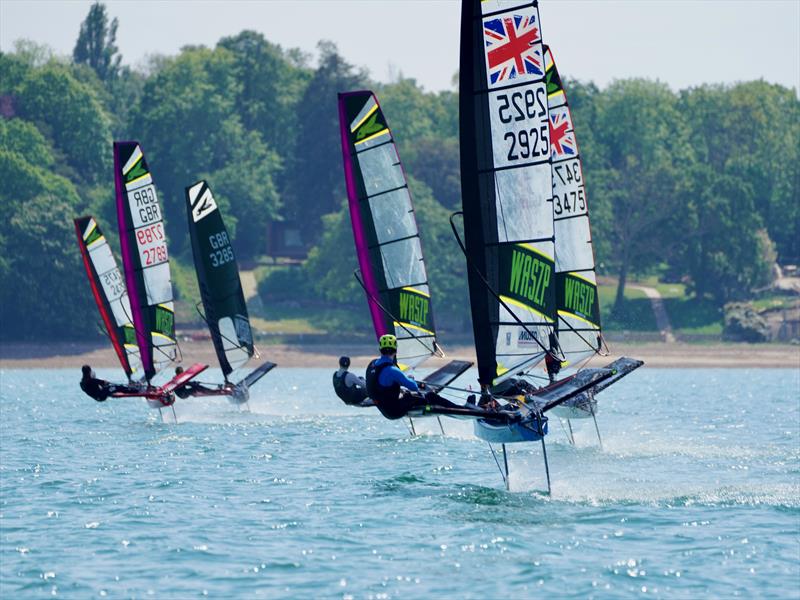 Racing during the WASZP GP at the Royal Victoria Yacht Club photo copyright Nici Hoyle taken at Royal Victoria Yacht Club, England and featuring the WASZP class