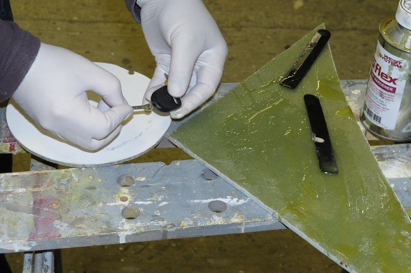 Repairing a set of old car keys with leftover epoxy mixture photo copyright WSI taken at  and featuring the  class