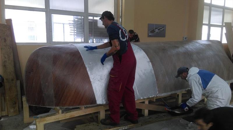 Croatian Gajeta build - second layer is going on, made up of pre-cut sections of cloth - photo © West System International
