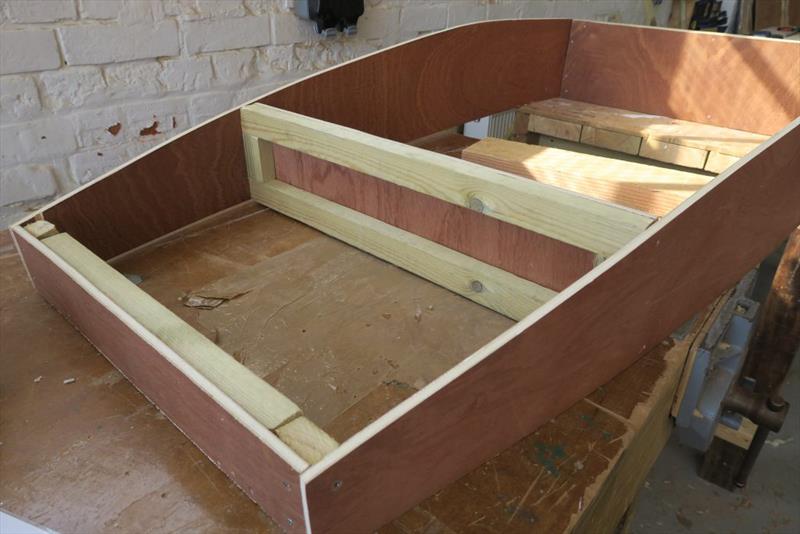 The Mouse Boat has a curved bottom. Students achieve this by deflecting a wooden measuring batten in the middle to get the right amount of curve photo copyright Wessex Resins & Adhesives taken at  and featuring the  class