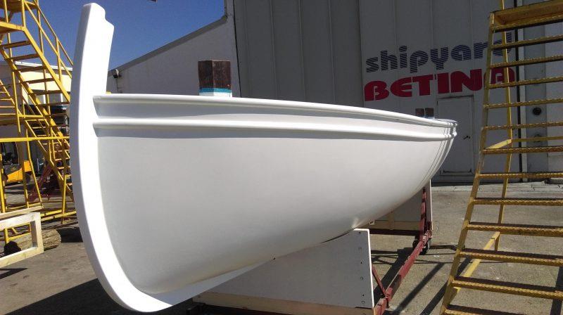 After a coat of primer and two coats of undercoat, the hull is looking great - photo © Wessex Resins & Adhesives
