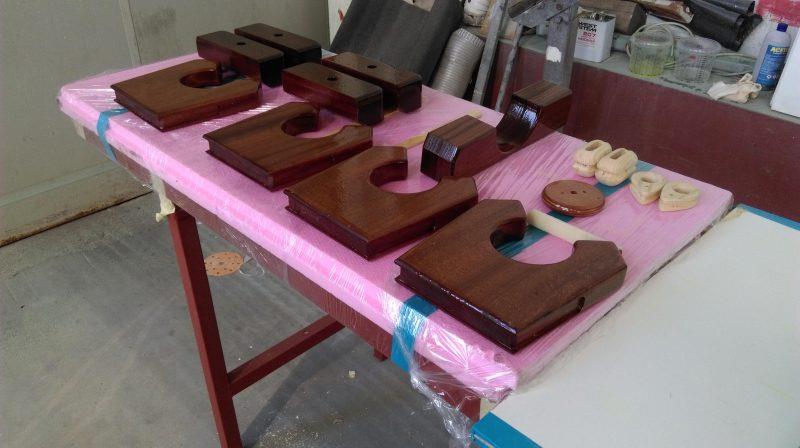 The shapes for the rowlocks, blocks and other functional pieces have been cut from solid mahogany - photo © Wessex Resins & Adhesives