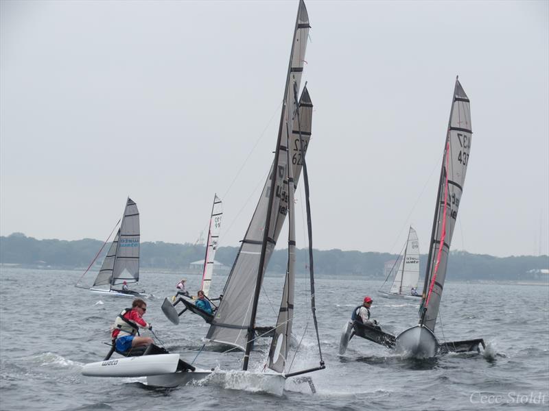 Weta trimarans in action photo copyright Cece Stoldt taken at Fort Walton Yacht Club and featuring the Weta class