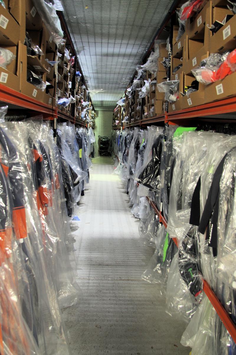 Inside the Shoeburyness warehouse of Wetsuit Outlet photo copyright Mark Jardine taken at  and featuring the  class