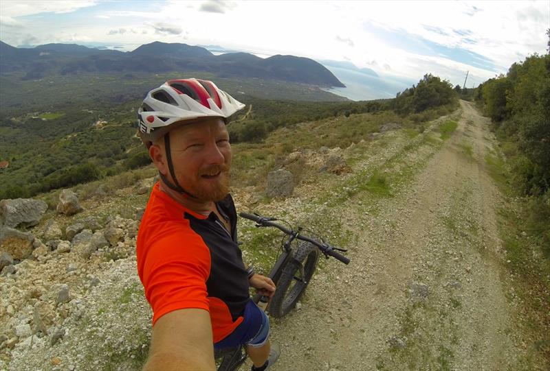 Joe out on his fat wheel mountainbike in Vassiliki - photo © Wildwind