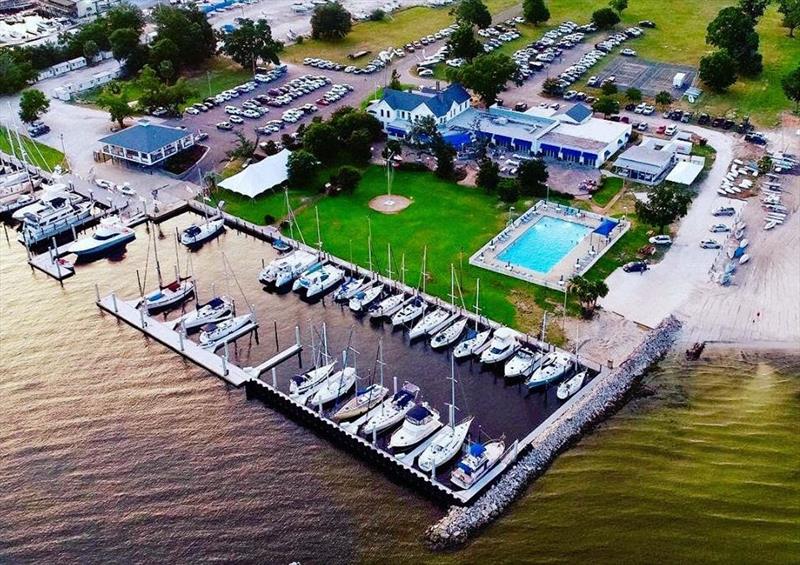 Pensacola Yacht Club, home to the 2018 Kona Windsurfing North Americans, boasts 22 acres of private waterfront property, a 250 ft wide beach for dinghy & board launching, a refreshing pool for cooling down, and a prize winning bar & grill for chilling out - photo © Tim Ludvigsen