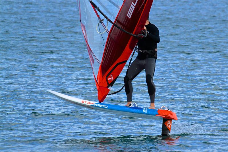 JP Tobin exits a foiling gybe in light airs - Takapuna Beach - October 2018 - photo © Richard Gladwell