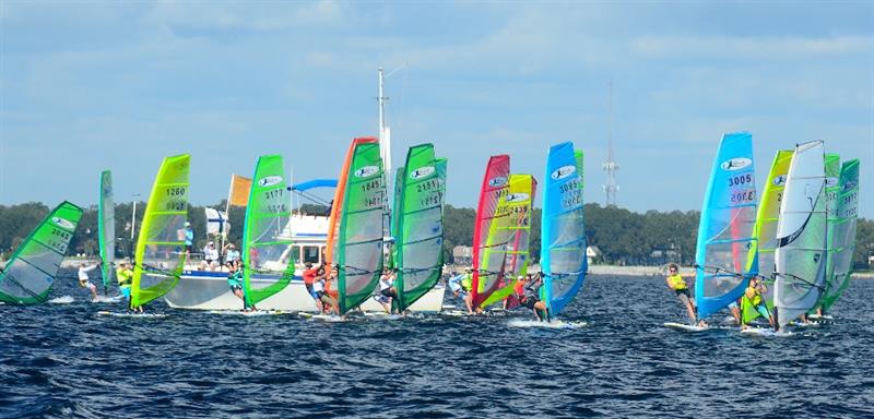 The 2018 Kona North Americans on Pensacola Bay is certainly colorful. Men, women, masters and under 18's sail in one large fleet in different weight divisions designated by sail color from Yellow for light to Orange for heavy photo copyright Talbot Wilson taken at Pensacola Yacht Club and featuring the Windsurfing class