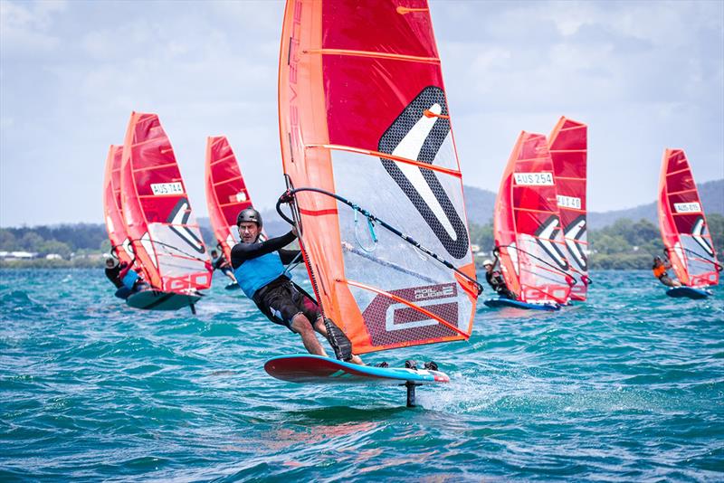 Simon Tribe commanding the Free Foil fleet - Bris Vegas Windfoil Pro photo copyright Sarah Motherwell taken at Royal Queensland Yacht Squadron and featuring the Windsurfing class