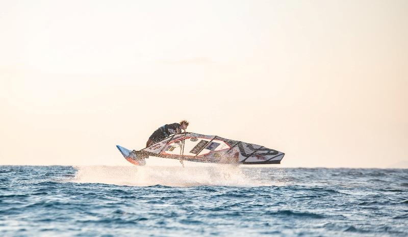 Lennart Neubauer rotating through an Airfunnel Burner - EFPT Theologos 2021, day 1 photo copyright PROtography taken at  and featuring the Windsurfing class