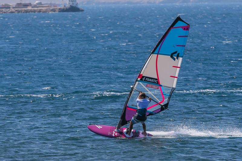 Just before taking off, oversheet the sail by pulling it back and down with the sail hand photo copyright Tricktionary taken at  and featuring the Windsurfing class