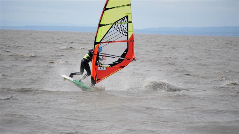 Alex Roessler rotating through an Air Jibe - photo © Freestyle Pro Tour