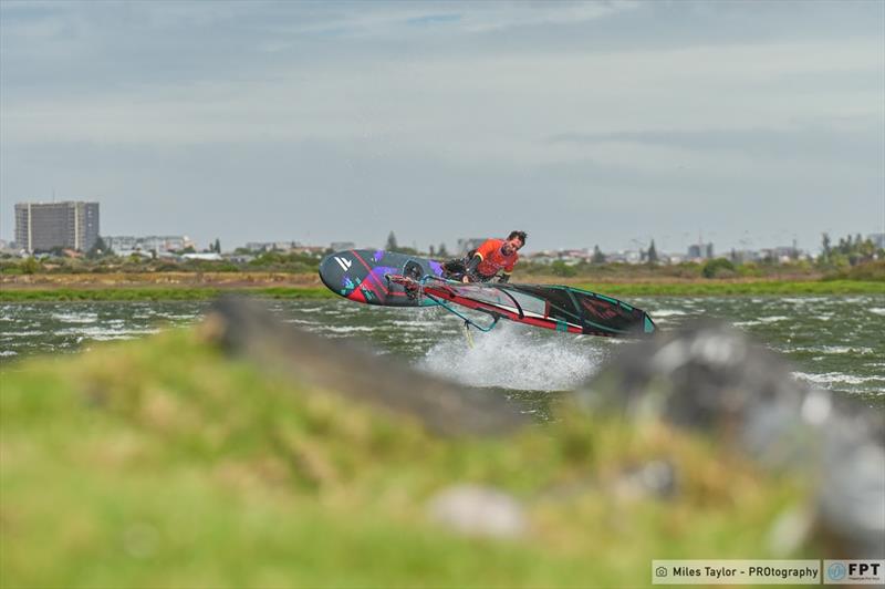 Bosson managing to rotate into a Burner after an impressive high wind duck photo copyright Miles Taylor / PROtography / FPT taken at  and featuring the Windsurfing class