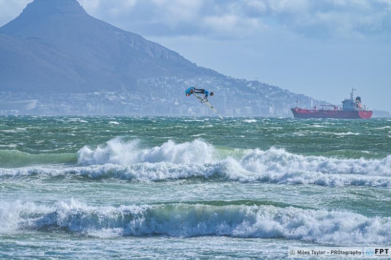 Alessio Stillrich using Cape Town as a backdrop for his massive Pushloop photo copyright Miles Taylor / PROtography / FPT taken at  and featuring the Windsurfing class