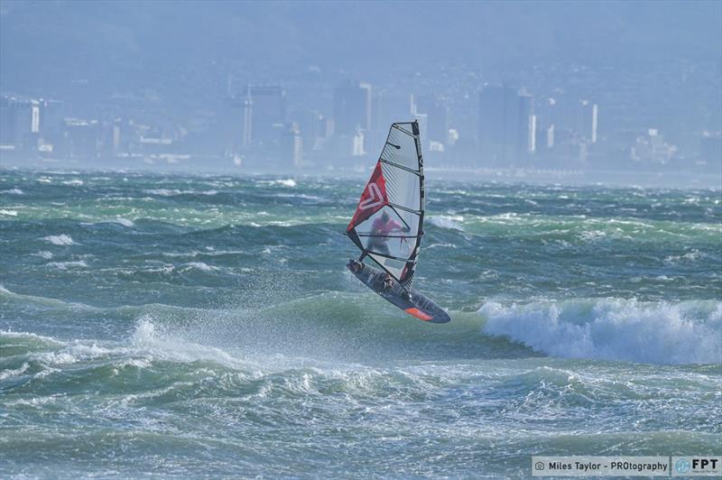 Pauline Katz sending herself into a Forward Loop in crazy conditions photo copyright Miles Taylor / PROtography / FPT taken at  and featuring the Windsurfing class