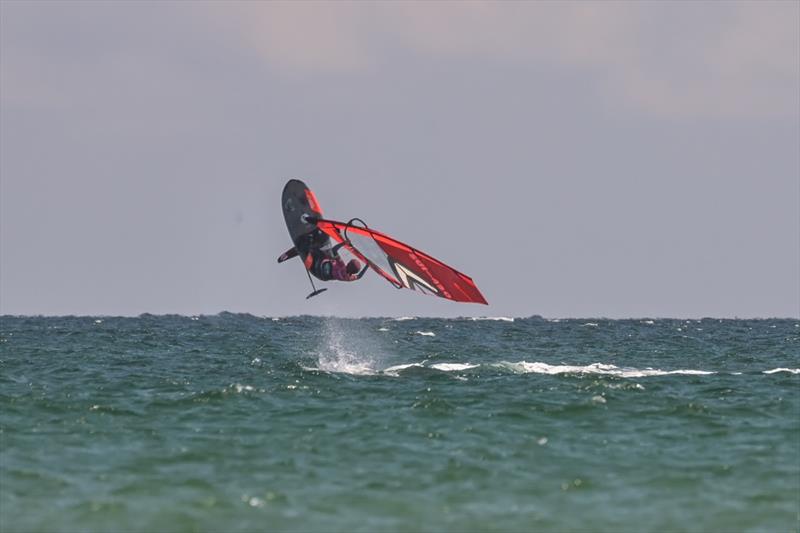 Lucie Honegger going for a Backloop - 2023 EFPT Vieste, Day 2 photo copyright Protography Official taken at  and featuring the Windsurfing class