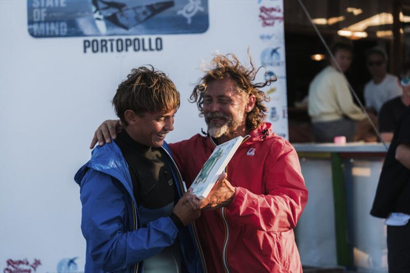 Ercole Rosso-Chioso shared a wholesome moment of joy with his father and main event organizer Augusto before stepping up onto the podium - photo © Richard Buchner