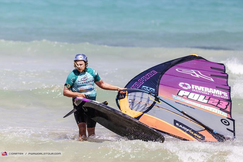 Maciek Rutkowski ponders on Day 3 of the Fuerteventura PWA Grand Slam photo copyright Carter / PWAWorldTour.com taken at  and featuring the Windsurfing class