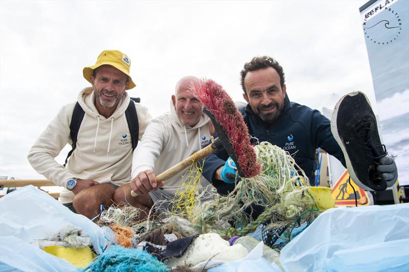 The results of the beach clean up - a lot of plastic waste recovered from the natural beach and will now find a place in recycling for future use and reuse photo copyright Nicolas Peltier taken at  and featuring the Windsurfing class