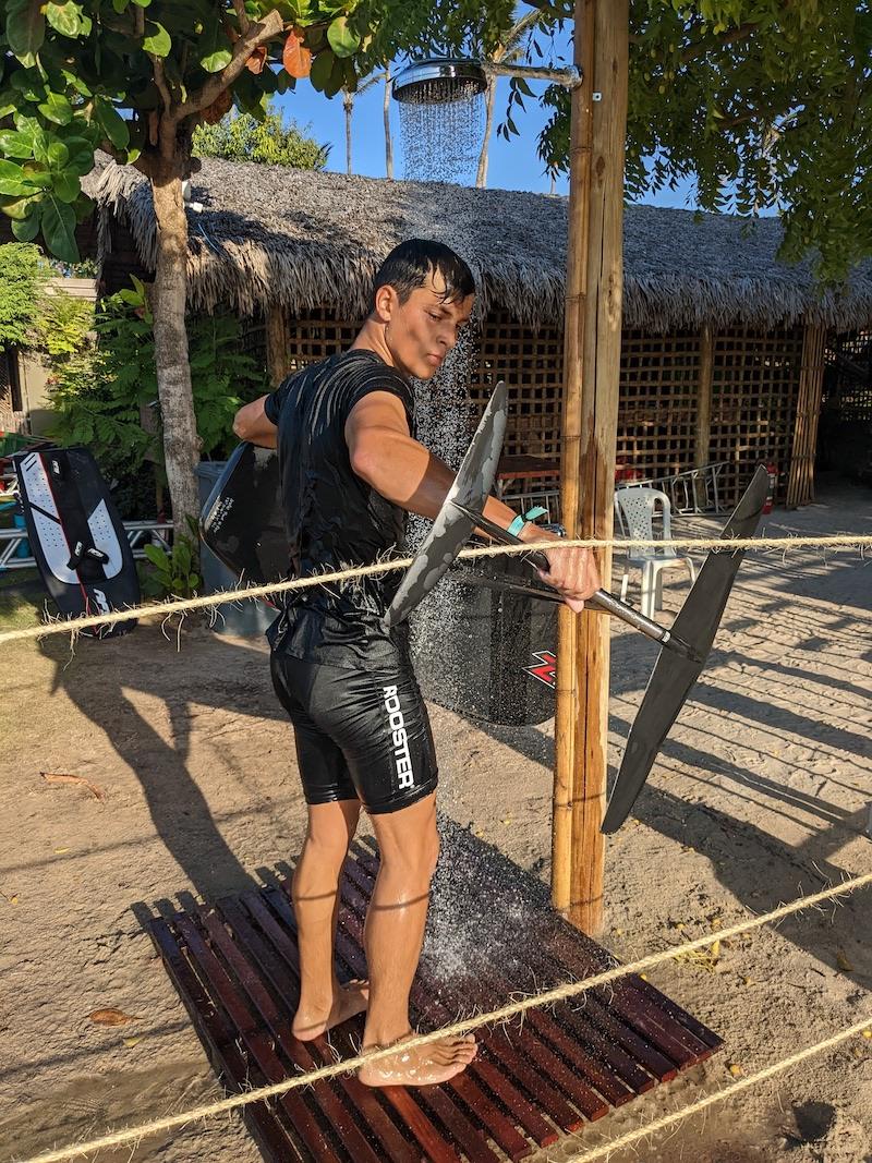 Mathis Ghio hoses down after a perfect day - 2022 Wingfoil Racing World Cup Jericoacoara photo copyright IWSA / Jeri Wingfoil Cup taken at  and featuring the Wing Foil class
