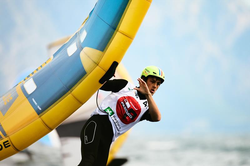 High precision manoeuvre from world champion Ghio - Pascucci WingFoil Racing World Cup Campione del Garda 2023 - Day 2 photo copyright IWSA media / Robert Hajduk taken at Campione Univela and featuring the Wing Foil class