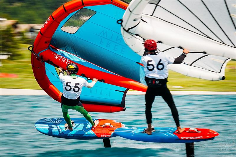 Alexandre Rouys (55) being chased hard by Clement Colmas (56) - 2023 WingFoil Racing World Cup Ensis Engadinwing by Dakine - Day 2 - photo © IWSA media / Sailing Energy