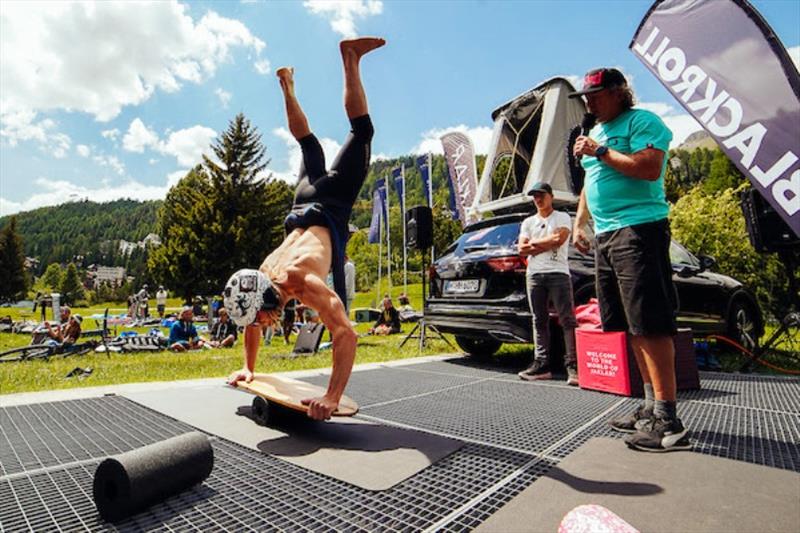 Balz Mueller continues his circus act on the balance board - 2023 WingFoil Racing World Cup Ensis Engadinwing by Dakine - Day 3 - photo © IWSA media / Sailing Energy